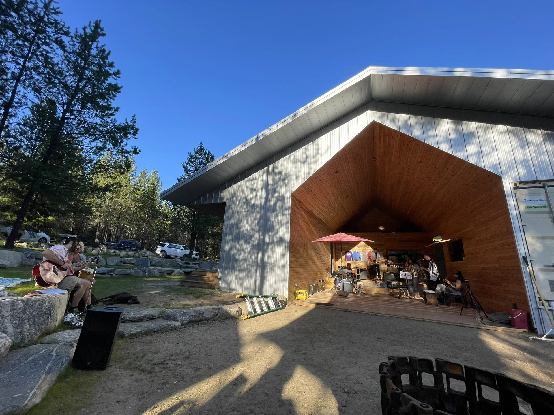 Outdoor showers and washroom facilities at Little Camp Slocan